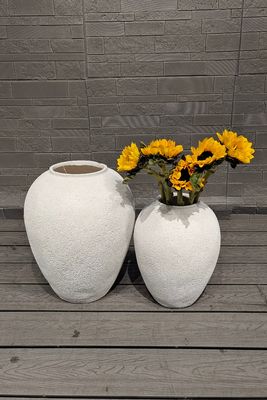 ثقوب تصريف في وعاء أسمنت الألياف المستديرة لعشاق النباتات